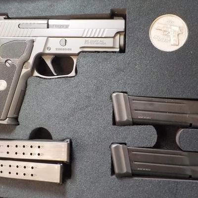" Sig P 229 Legion Pistol" with case and Mags. est $700 to $1300. (new)