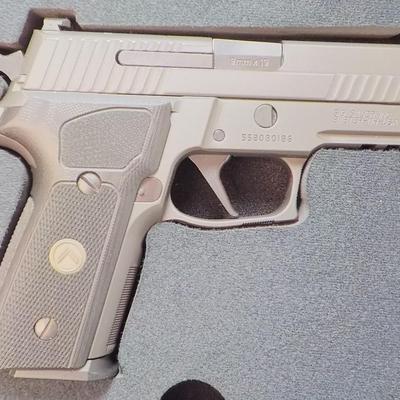 " Sig P 229 Legion Pistol" with case and Mags. est $700 to $1300. (new)
