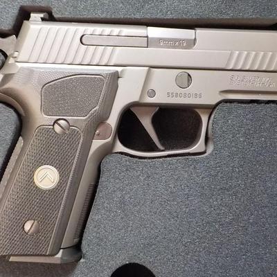 " Sig P 229 Legion Pistol" with case and Mags. est $700 to $1300. (new)