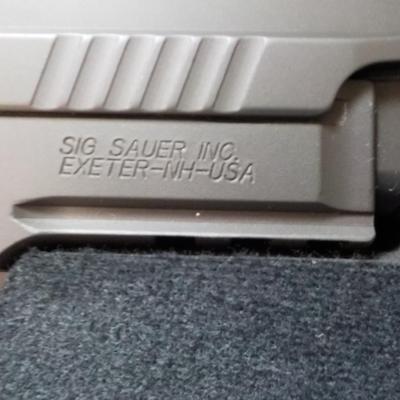" Sig P 229 Legion Pistol" with case and Mags. est $700 to $1300. (new)