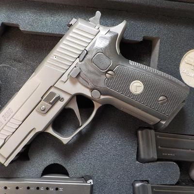 " Sig P 229 Legion Pistol" with case and Mags. est $700 to $1300. (new)