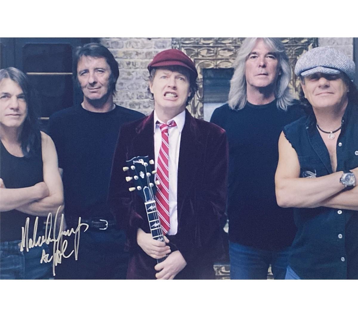 AC/DC Malcolm Young signed photo | EstateSales.org