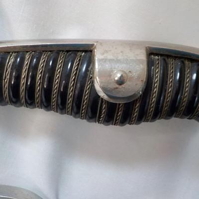 Original WW2 German Army M1890 NCO Sword and scabbard. est . $200 to $800.