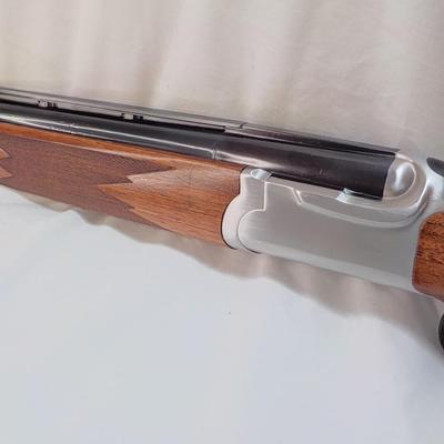 " Ruger Red Label Over and Under 12 Ga. Shot Gun. est. $700 to $1200..