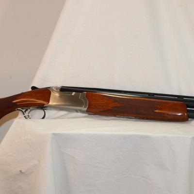 " Ruger Red Label Over and Under 12 Ga. Shot Gun. est. $700 to $1200..