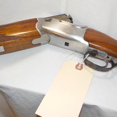 " Ruger Red Label Over and Under 12 Ga. Shot Gun. est. $700 to $1200..