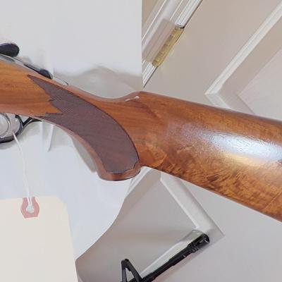 " Ruger Red Label Over and Under 12 Ga. Shot Gun. est. $700 to $1200..