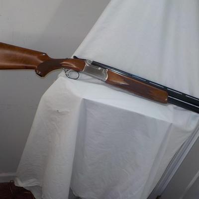 " Ruger Red Label Over and Under 12 Ga. Shot Gun. est. $700 to $1200..