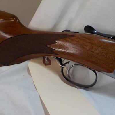 " Ruger Red Label Over and Under 12 Ga. Shot Gun. est. $700 to $1200..