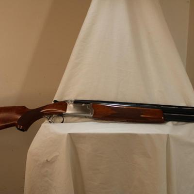" Ruger Red Label Over and Under 12 Ga. Shot Gun. est. $700 to $1200..