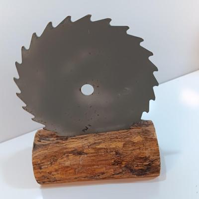 Hand painted saw blade signed by artist Chew Mail Pouch Tobacco barn with log display