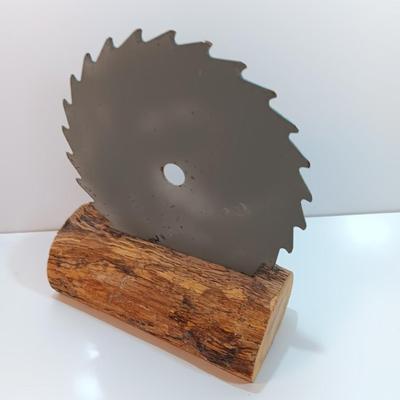 Hand painted saw blade signed by artist Chew Mail Pouch Tobacco barn with log display
