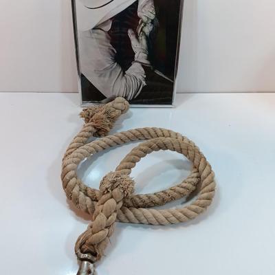 Black and white framed art Cowboy bull rider with a nice lead rope