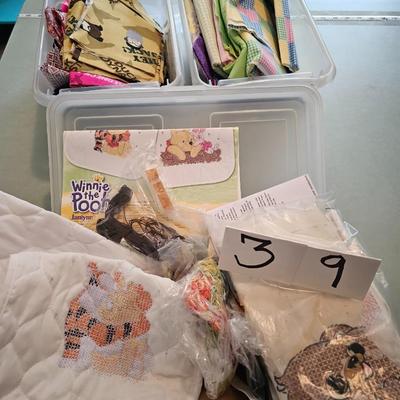 3 containers of fabric pieces and embroidery 