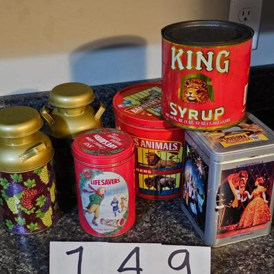 Collectible tins including beauty and the beast