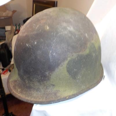 U.S.Army Early Viet Nam Helmut/ rice paddie stain. Liner also. est. $30 to $100.