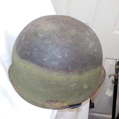 U.S.Army Early Viet Nam Helmut/ rice paddie stain. Liner also. est. $30 to $100.