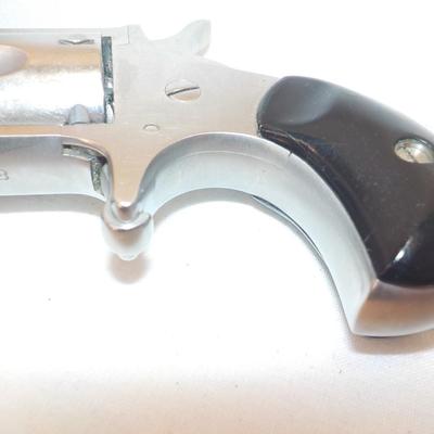 North American Arms/ 5 shot / 22LR/ Single action vest gun.est. $75 to $250.