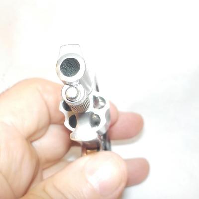 North American Arms/ 5 shot / 22LR/ Single action vest gun.est. $75 to $250.