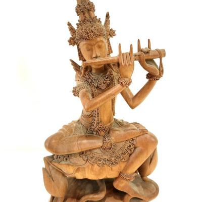 Lot #34  Hand Carved Bodhisattva or Divinity Playing a Flute - Balinese
