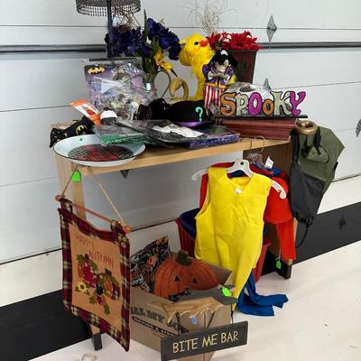 Lot 20: Children's playtime costumes, holiday decor, lamp and table