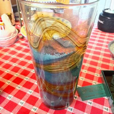 Tall glass vase with blue green swirls, and polished Pontil.