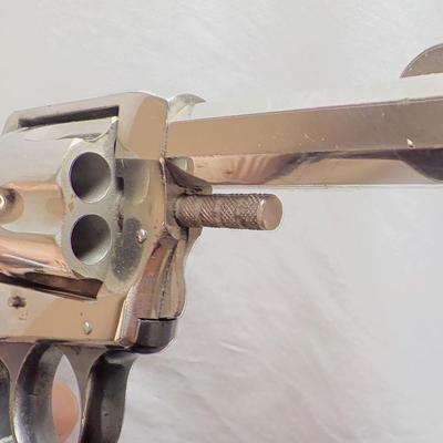 " The American 32 Cal. Double action Revolver" By HR. Worcester. est. $100 to $200.