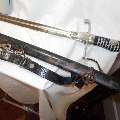 WW2 German NCO Sword. with Tasle connector. est. $150 to $400.