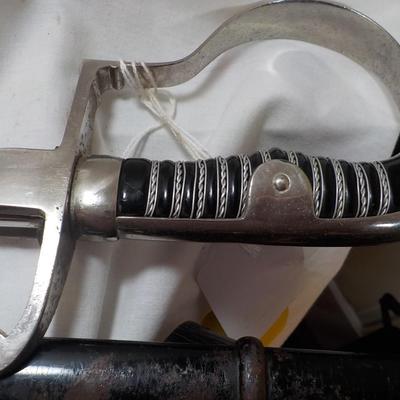 WW2 German NCO Sword. with Tasle connector. est. $150 to $400.