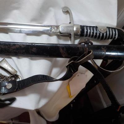 WW2 German NCO Sword. with Tasle connector. est. $150 to $400.