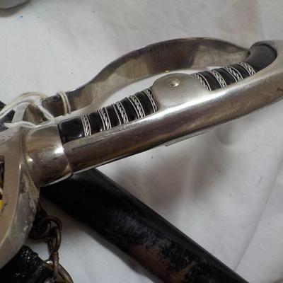 WW2 German NCO Sword. with Tasle connector. est. $150 to $400.
