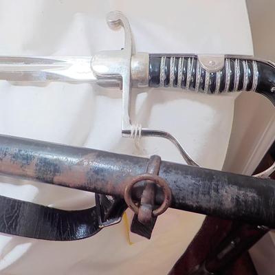 WW2 German NCO Sword. with Tasle connector. est. $150 to $400.