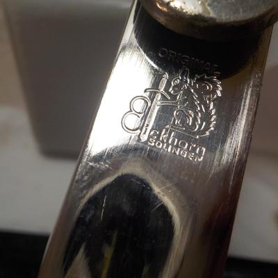WW2 German NCO Sword. with Tasle connector. est. $150 to $400.
