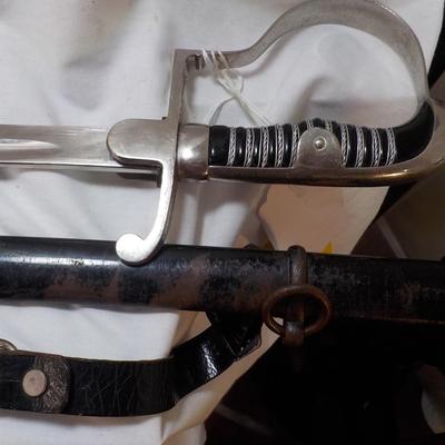 WW2 German NCO Sword. with Tasle connector. est. $150 to $400.