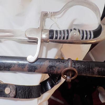 WW2 German NCO Sword. with Tasle connector. est. $150 to $400.