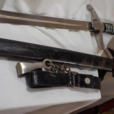 WW2 German NCO Sword. with Tasle connector. est. $150 to $400.