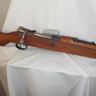 Refurbished Yugoslavian M8 Mauser 8 mm rifle. $300 to $700.