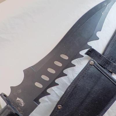 Combat Machete 19 in. lenght with scabbard. est. $25 to $85