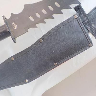 Combat Machete 19 in. lenght with scabbard. est. $25 to $85