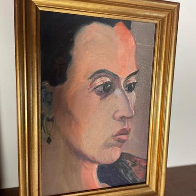 Original painting by Karen Morrow. Woman with black hair & dangle earrings.