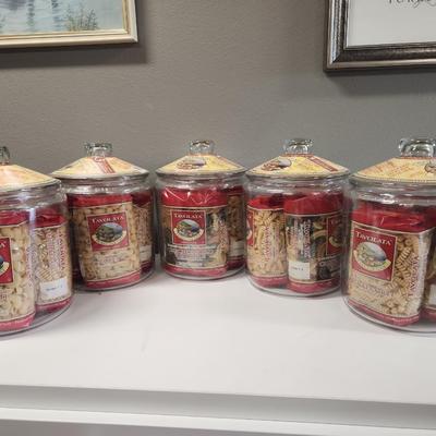 5 glass jars with pasta