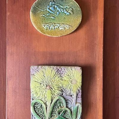2 small ceramic painted plaques.