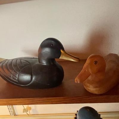 2 wooden decoys