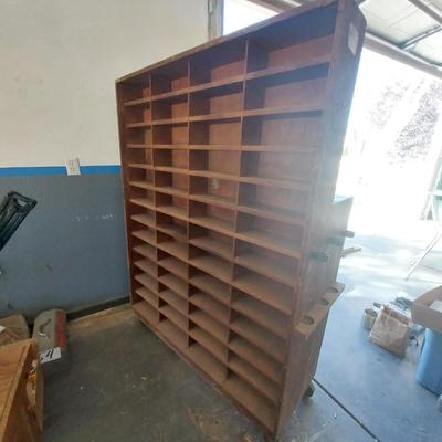 DOUBLE SIDED WOODEN SECTIONED SHELF AND SHELVING ON THE OTHER SIDE