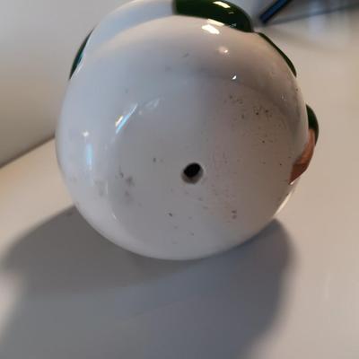 Two matching snowman pillar candle holders