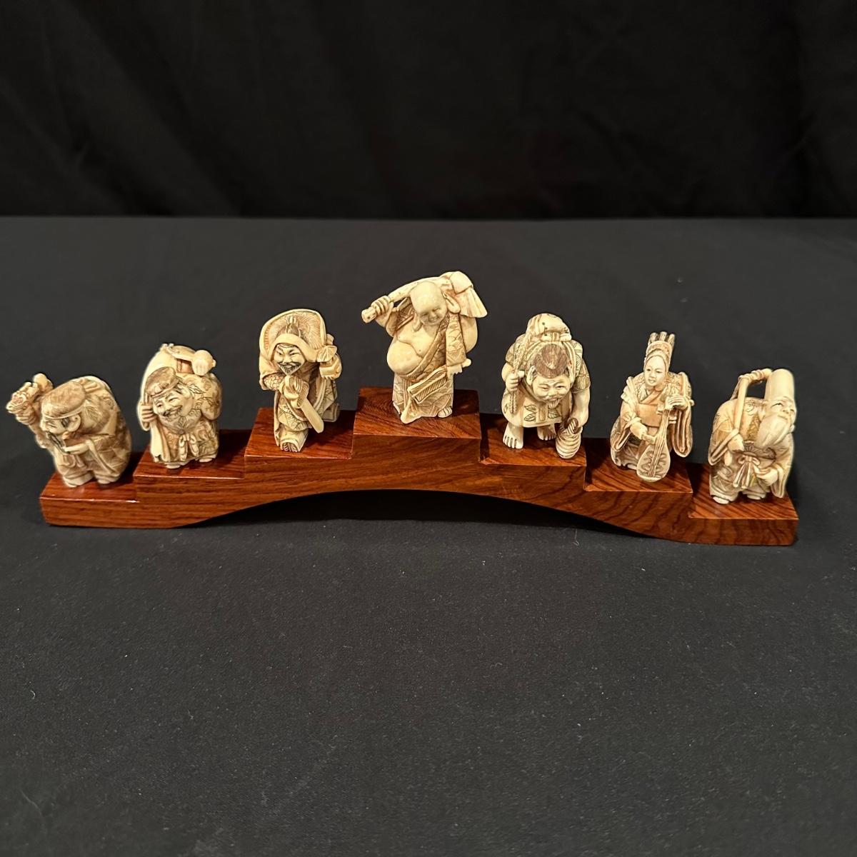 The Seven Immortals Carved Figurines on Wooden Stand (SRKL