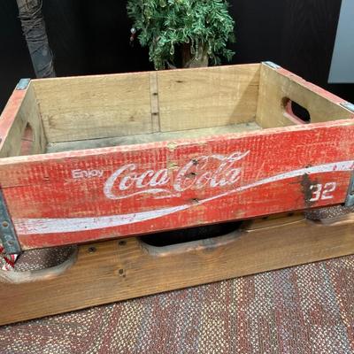 Coca-Cola box sled and 2 trees