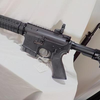Ruger AR 556 semi auto rifle, 10 round, est. $300 to $900.