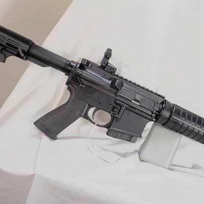 Ruger AR 556 semi auto rifle, 10 round, est. $300 to $900.