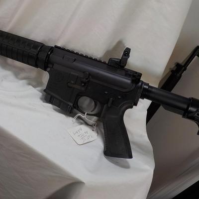 Ruger AR 556 semi auto rifle, 10 round, est. $300 to $900.